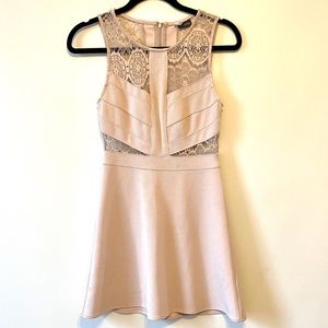 Fit and flare dress with lace cutouts